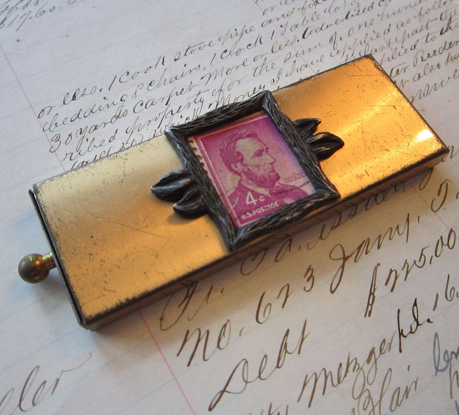 SALE - small metal box - gold tone with tiny frame and 4 cent Lincoln stamp