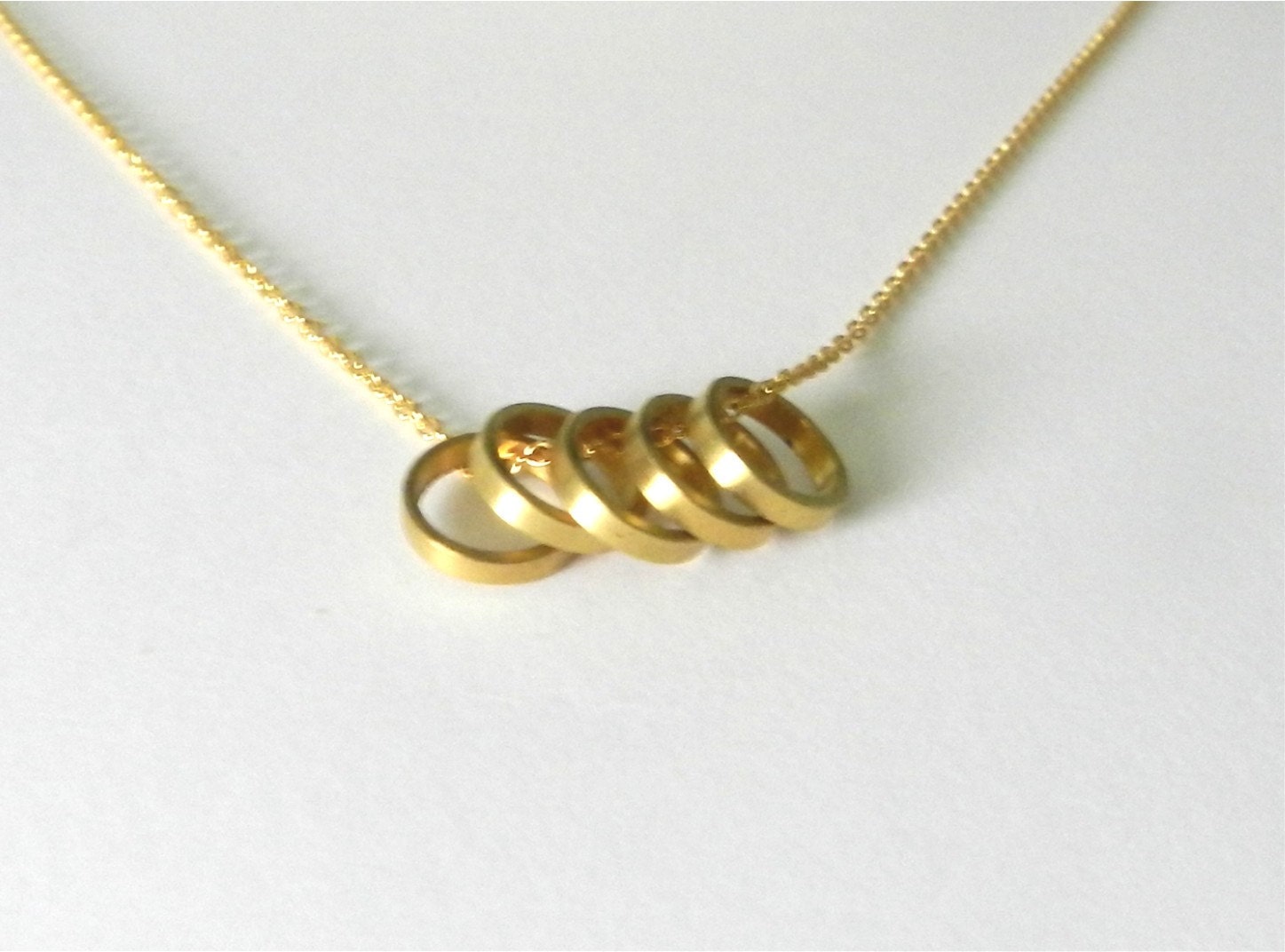 Brass rings necklace, five, modern minimal jewelry