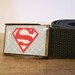 Superman Belt (Ready to Ship) shown on a charcoal strap