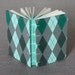 Argyle sketchbook with exposed stitching