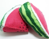 Two slices of watermelon plush toys