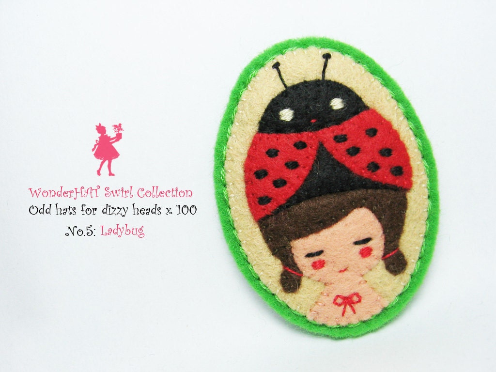 A Girl with a Ladybug hat felt pin - WonderHAT Swirl Collection
