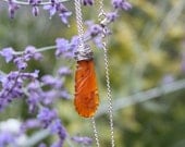 carved carnelian and silver pendant