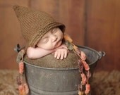 Newborn bonnet with tassels