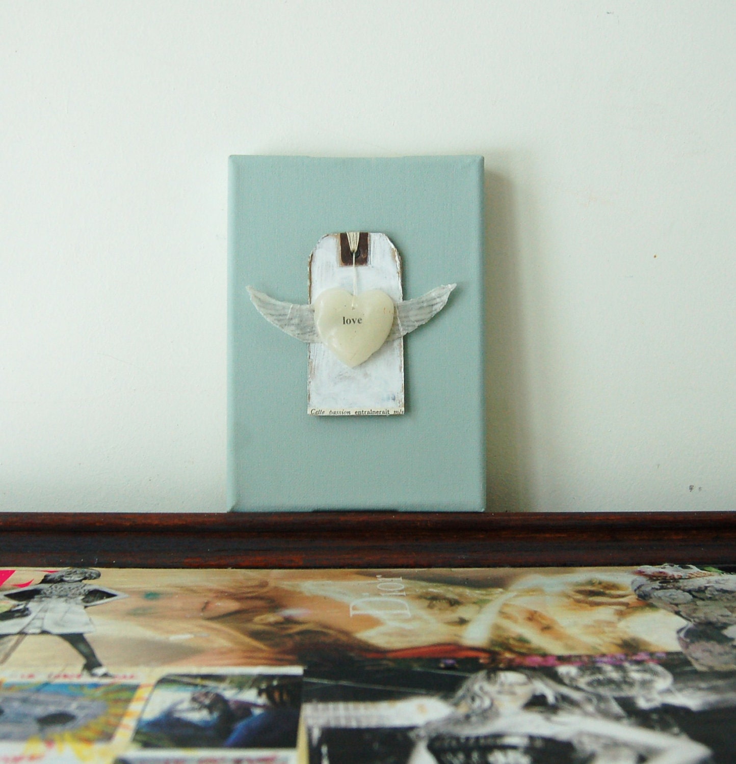 Wax heart  with wings on canvas