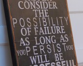 Never Consider the Possibility of Failure.  Distressed Black with White writing.  20 x 20 inches.