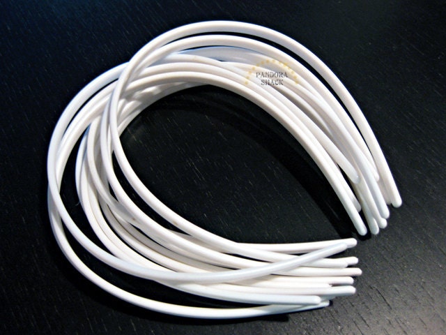 12 White Plastic Headbands 1/4". Economic and reliable. Plain and simple, ready to be embellished. Wholesale price. Fast and low Shipping