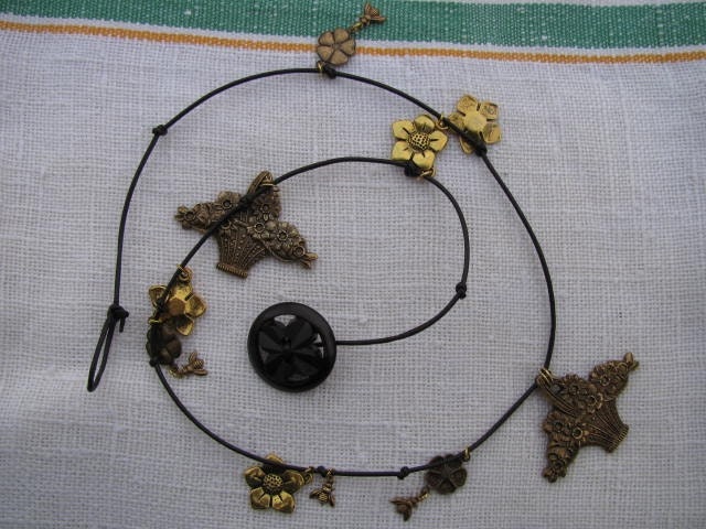 Handmade Leather Wrap Charm Bracelet with Antique Tooling theme "Flower Power"