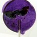 Lavender plum with cracked black pepper lollipop