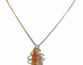 Caged Genuine Amber and Sterling Silver necklace