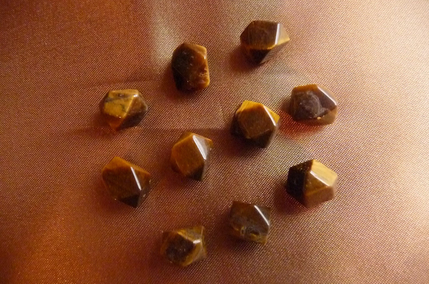 Bead, tigereye (natural), 8-10mm faceted tumbled pebble, PKG OF 10