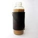 Leather Cozy: Fits GTs Kombucha Bottles as a tight sleeve