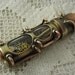 Steampunk USB flash drive with glowing interior and curved glass windows. 8 GIG. Copper, brass and glass. Waterproof.