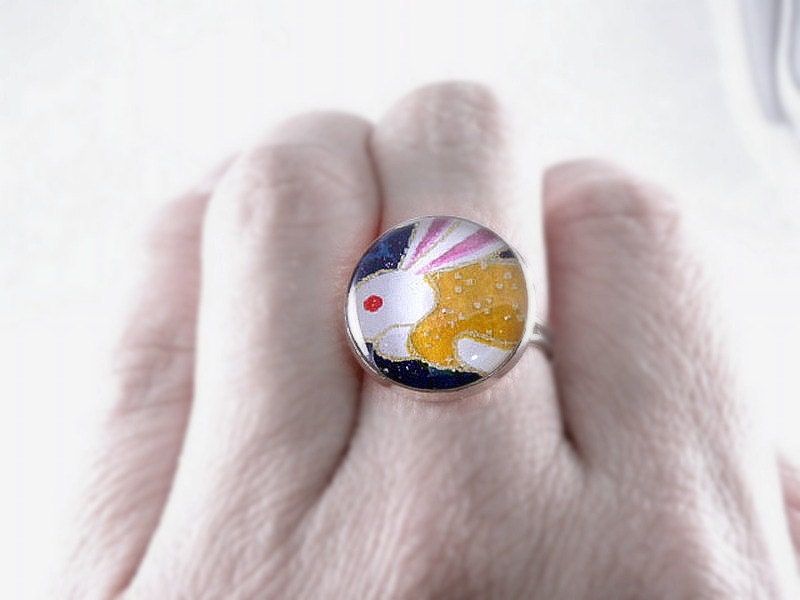 It's the Sneaky Bunny - fun little accessory -   16mm round ring with Beautiful Chiyogami under hand poured Glossy Protective Polymer Resin