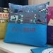 Hand-embroidered Reading Pillow with Book Pocket in Windy Day