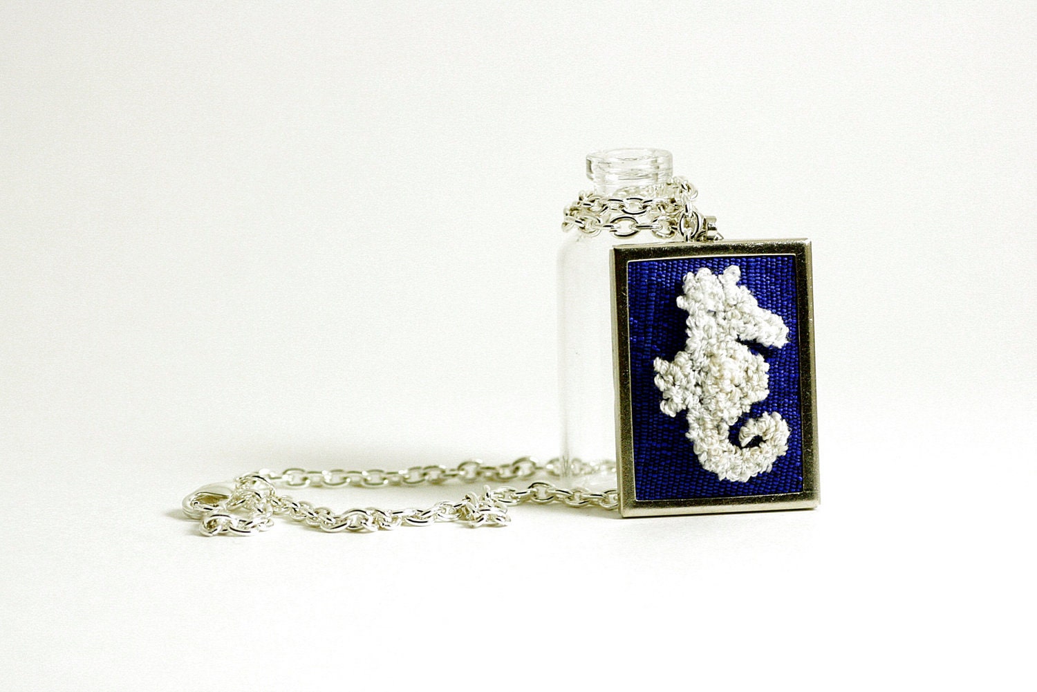 Seahorse Silhouette Nautical Jewelry on Cobalt Blue Silk. Silver Necklace, Rectangular. Summer Fashion. Punch Needle Embroidery.