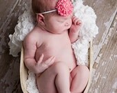 pink flower headband on white band for baby
