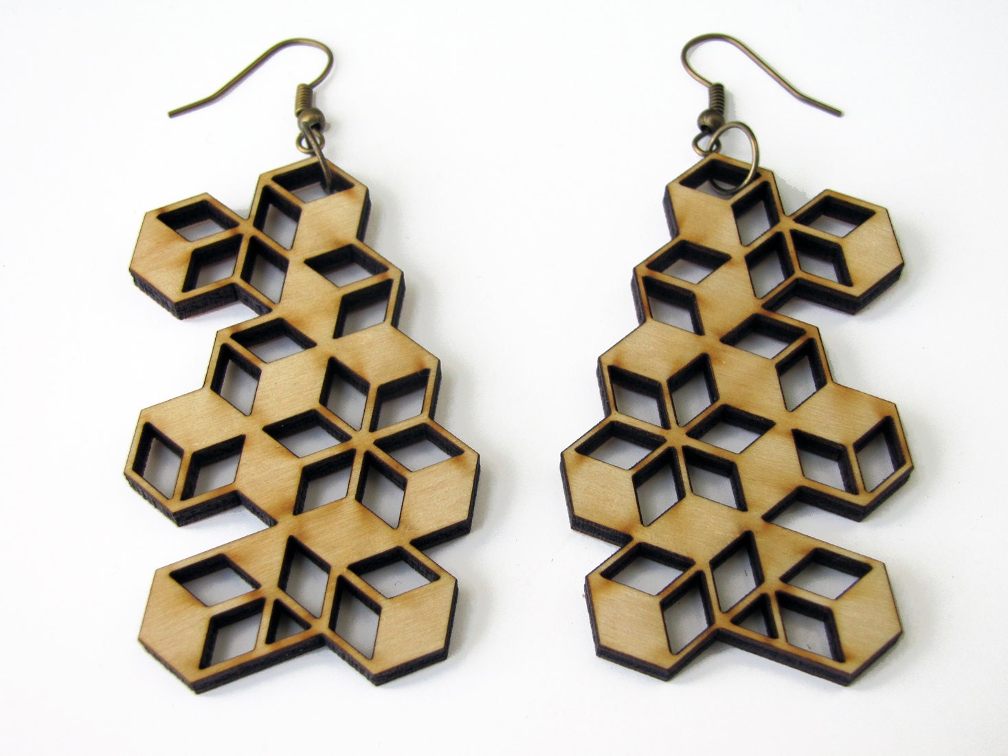 3D cubes illusion. Earrings in laser cut wood.