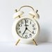 Vintage Russian mechanical alarm clock Slava from Soviet Union era NEVER USED