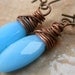 TURQUOISE Blue  Faceted Marquise Glass and Copper Wire Wrapped Earrings.