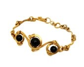 Wire Wrap Golden Bracelet with Black Onyx stones