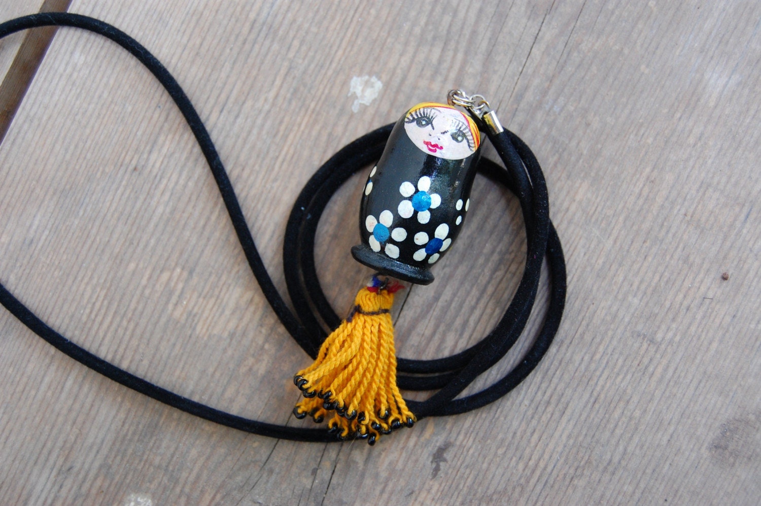 black and yellow russian doll necklace