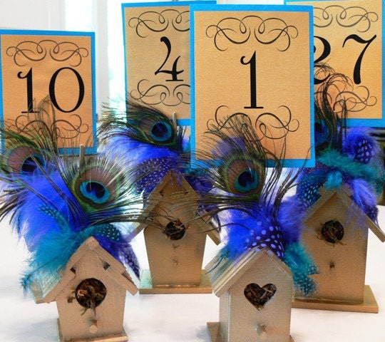 Birdhouse table number holders with Peacock, maribou and guinea feathers in your choice of colors