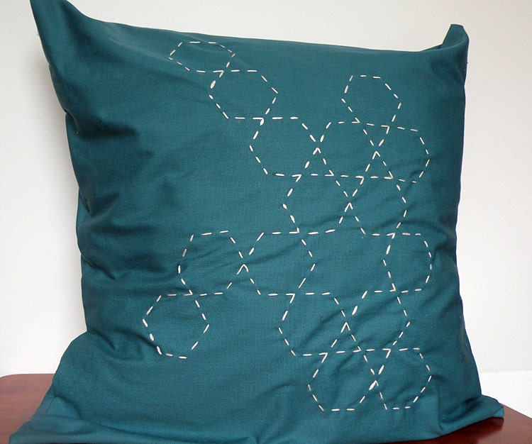 Teal pillow cover with white embroidered hexagons removable with envelope back