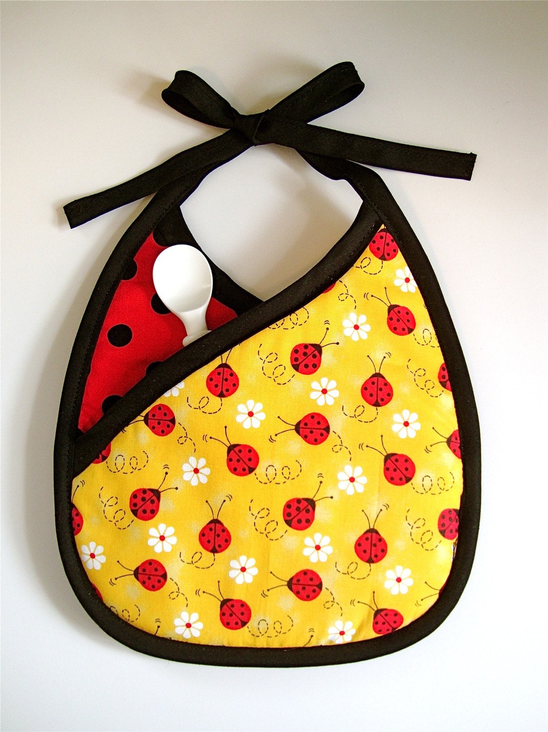 Ladybug Reversible Crossover Pocket Bib