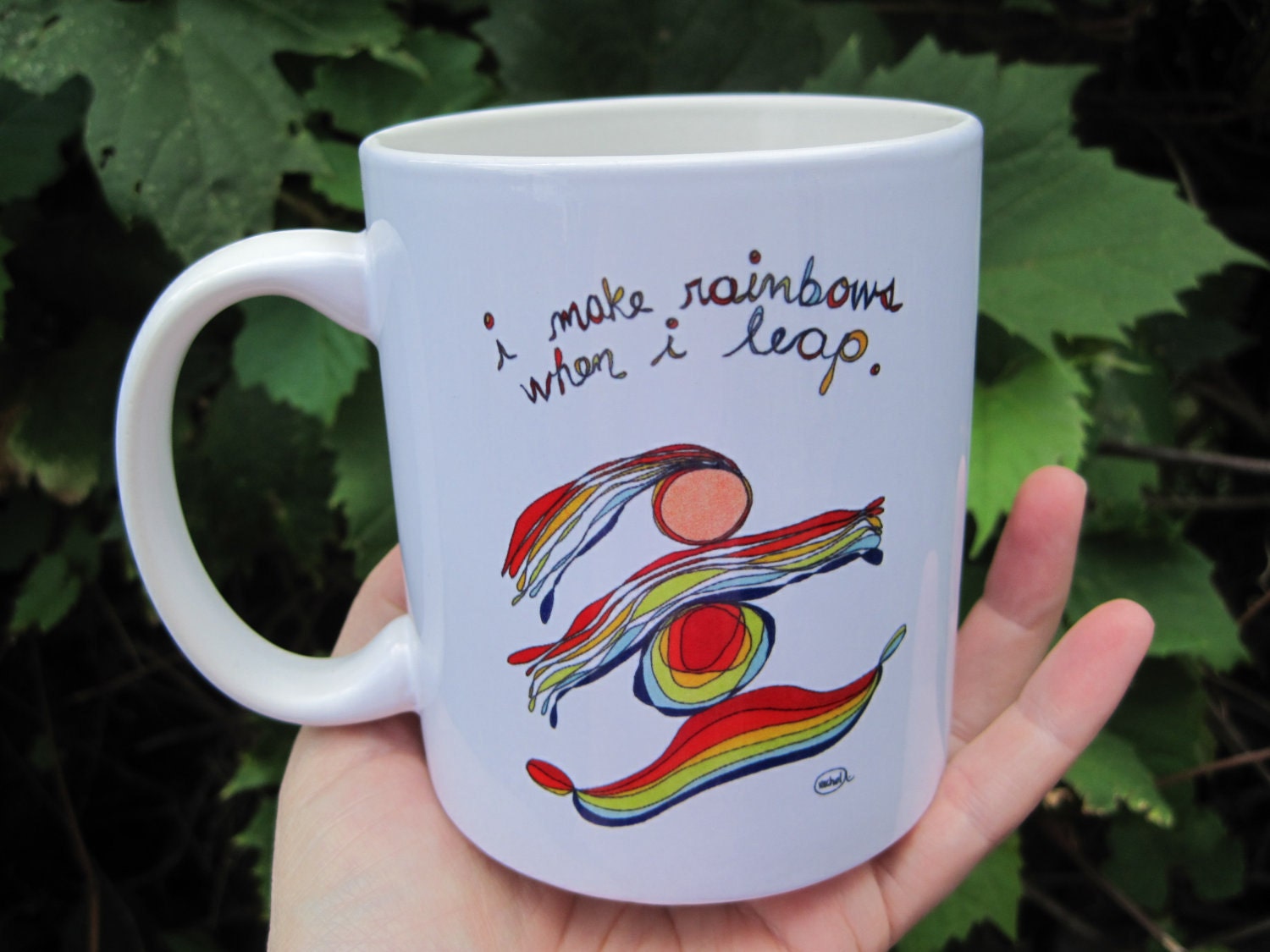 MUG titled i make rainbows when i leap. rachel awes.