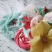 Easter Whim- aqua, pink, peach, coral and yellow rosette and flower collage headband with feather