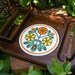 Septawood Cheese Board by Himark Enterprises, Inc. in Orange and Yellow