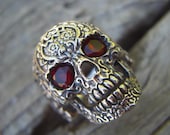 Sale....Sugar skull ring in sterling silver with blood red cz's for eyes