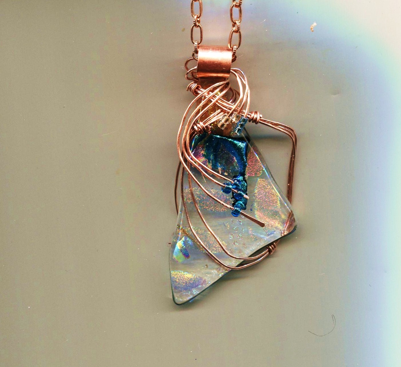 CLEARLY BEAUTIFUL...Dichroic and copper wire wrapped  pendant