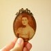 antique small metal frame with photo