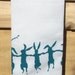 Cotton huck tea towel with teal dancing rabbits screen print pom pom trim