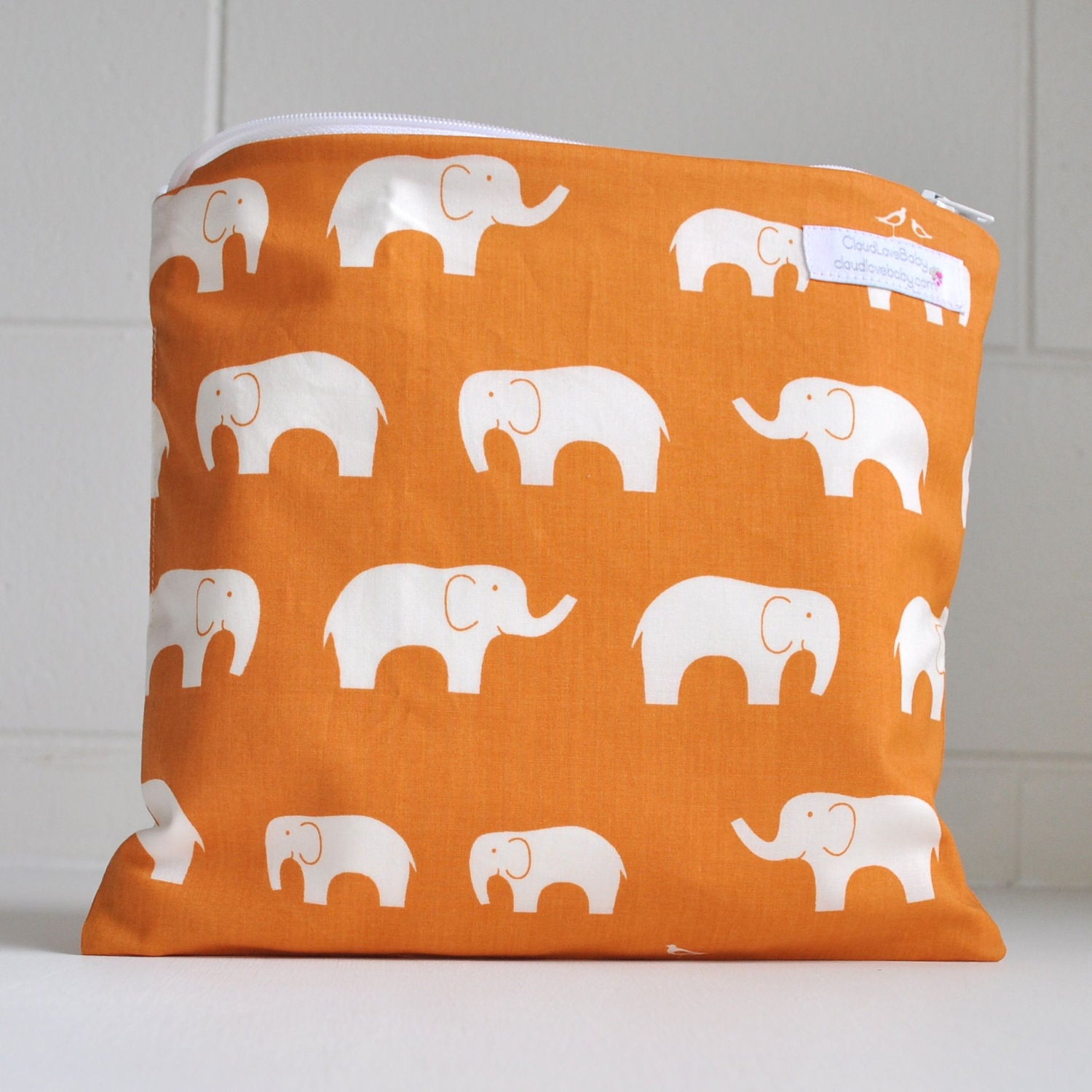 waterproof bag. wet bag. cosmetic bag. makeup bag. travel bag. Orange Ellie Fam