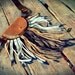 Brown leather pouch belt with fringe
