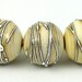 Antiqued Ivory with silver wrapping 3 - lampwork bead set of 5