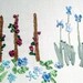 Silk Ribbon embroidered blue irises and dark pink roses