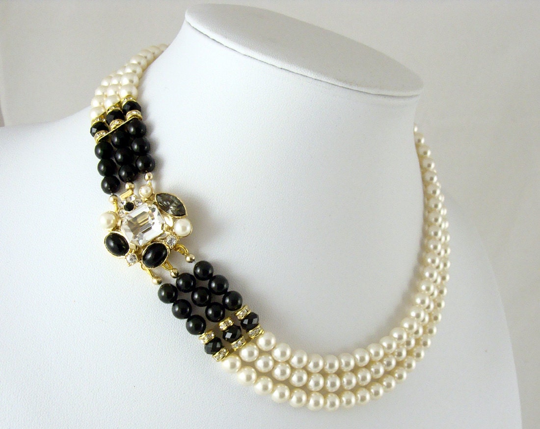 Triple strand Swarovski pearl necklace with ornate clasp and choice of black or cream accents