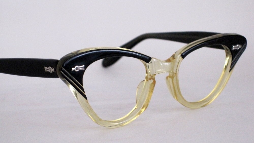 Vintage EyeGlasses Cat Eye Style. Great shape with carved Designs