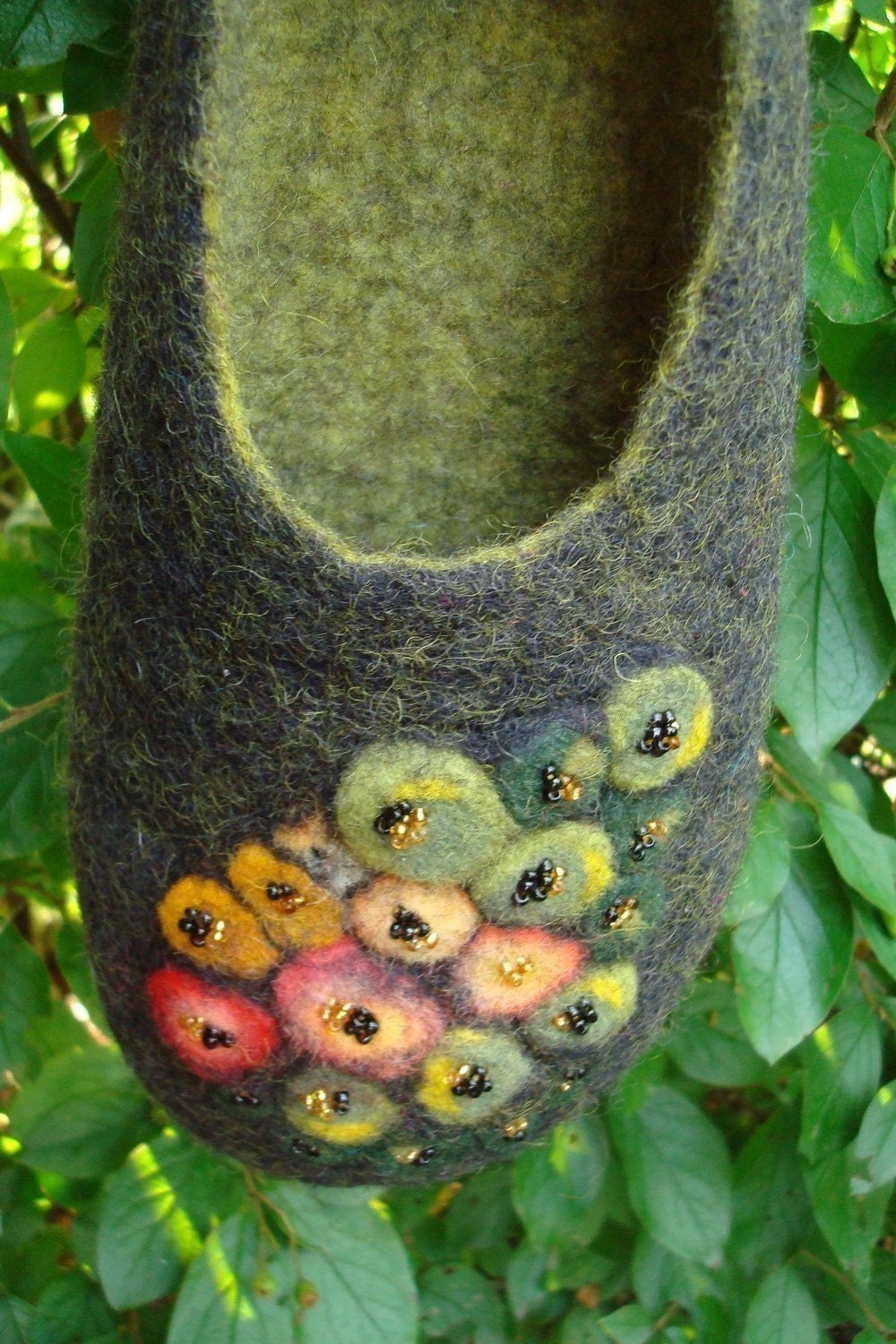 Felted black/green wool slippers with colorful decoration