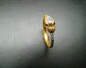 Snake Ring  14k gold  with Diamonds and rubies.