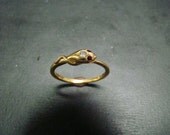 Very sweet 14K gold snake ring with diamond and ruby eyes