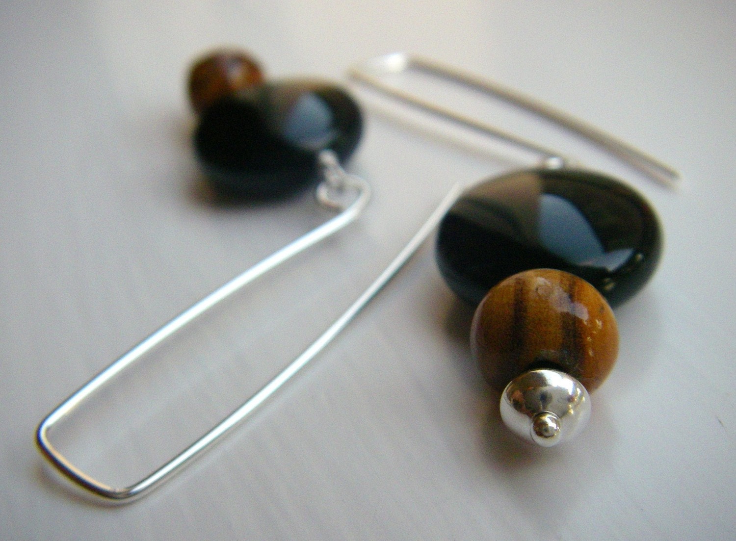 Wood, black, and silver earrings