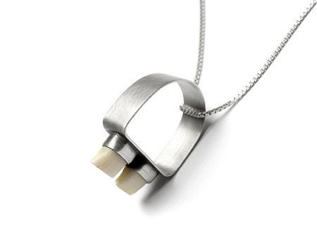 Sterling Silver and Two Human Teeth Ring
