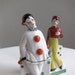 Two German Porcelain Figures of a Clown and a Bellhop, 1930s