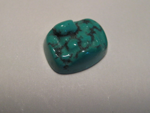 Natural Top Spider Web Turquoise cab   ................   9  x 7 x  4mm .......      800
