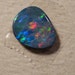 Australian Boulder Opal doublet ......... 11 x 9 x 2 mm thick a4852